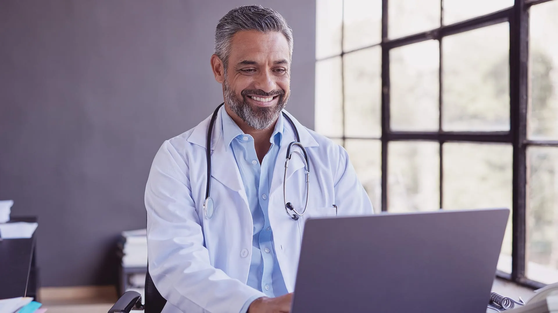 Clinician checking their practice online